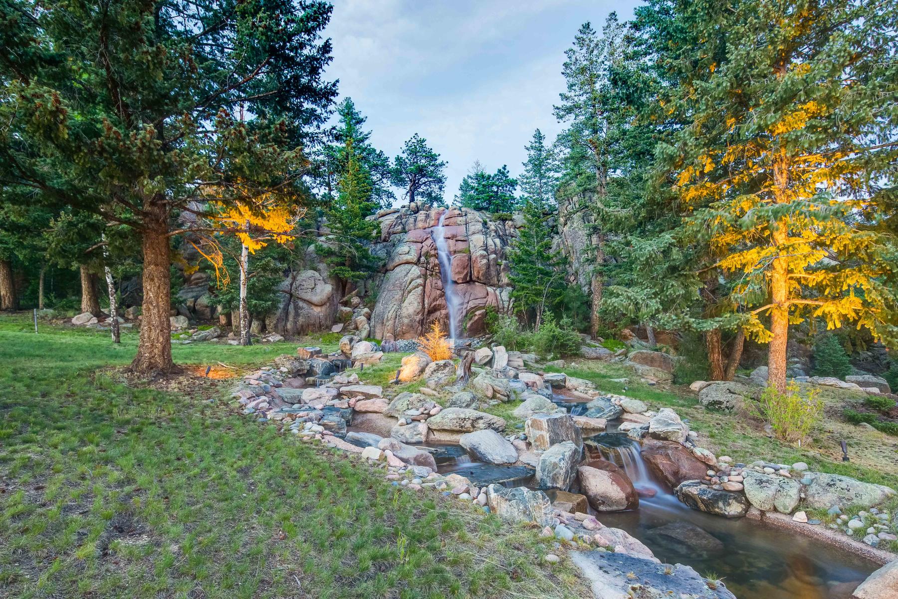 The Bandemer Team 6917 Timbers Drive Evergreen Colorado Luxury Real Estate Horse Property Mountain Home Serenity Falls Carriage House Equestrian Lifestyle Barn Exercise Facility 30 Acres Waterfall Water Features